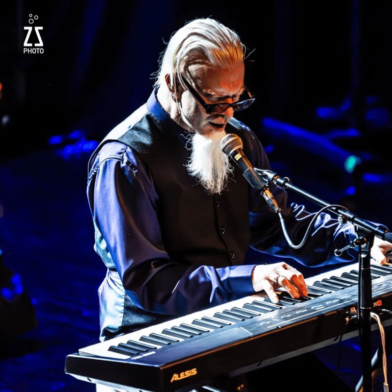 Aaron Nordstrom playing an electric piano.