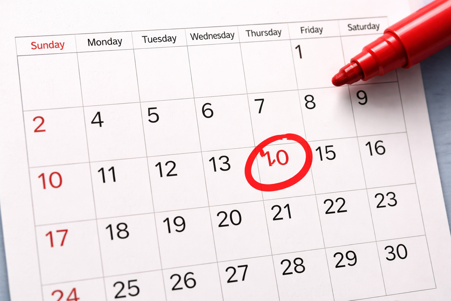 Graphic of a calendar, with a date circled in red.